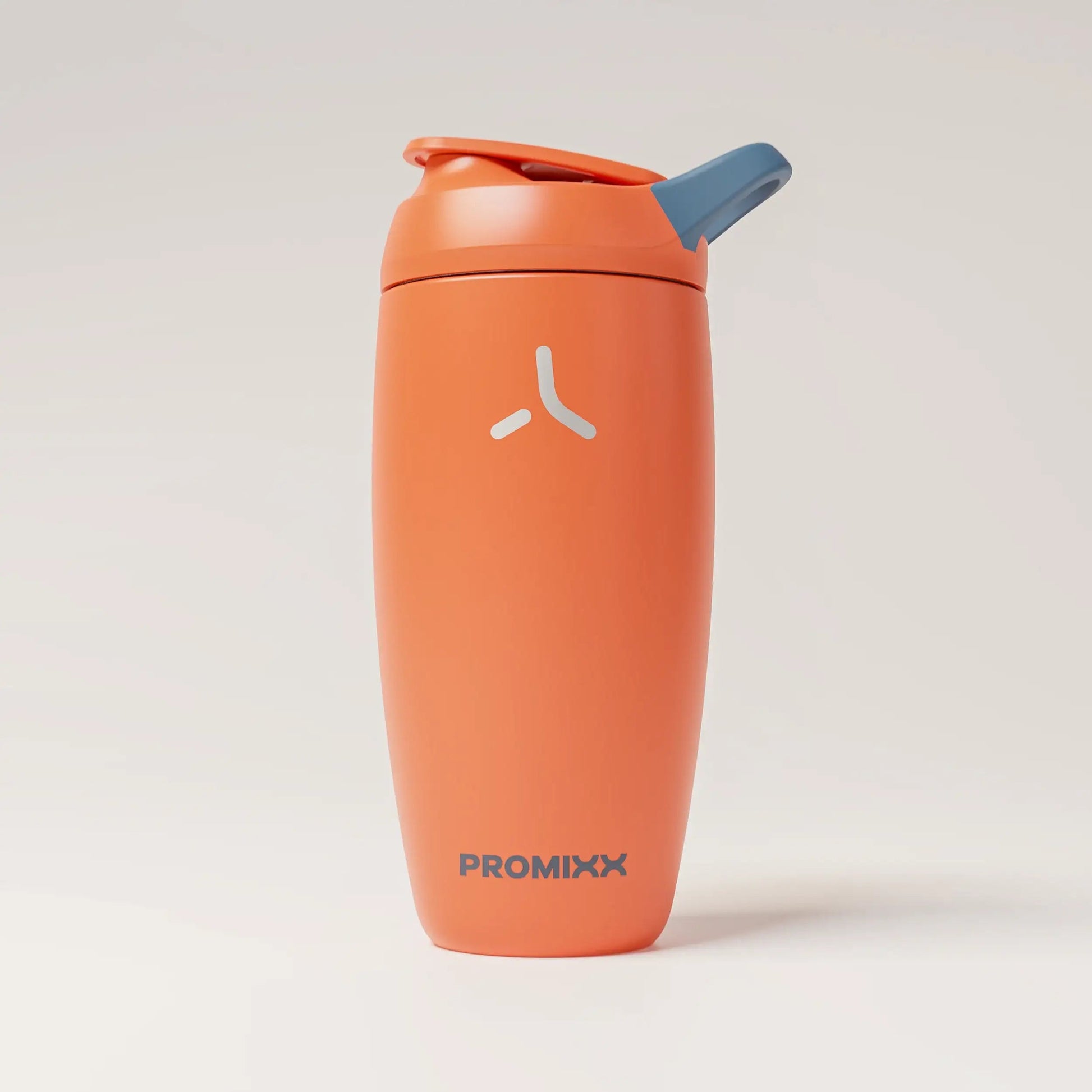 insulated-performance-shaker-bottle-q2 SHKR_18550_dwSS-S1.1_burntOrange_midnightBlue_1_1_hero_edit_98573fa4-4557-4dbd-9f16-b284eece3df3.png