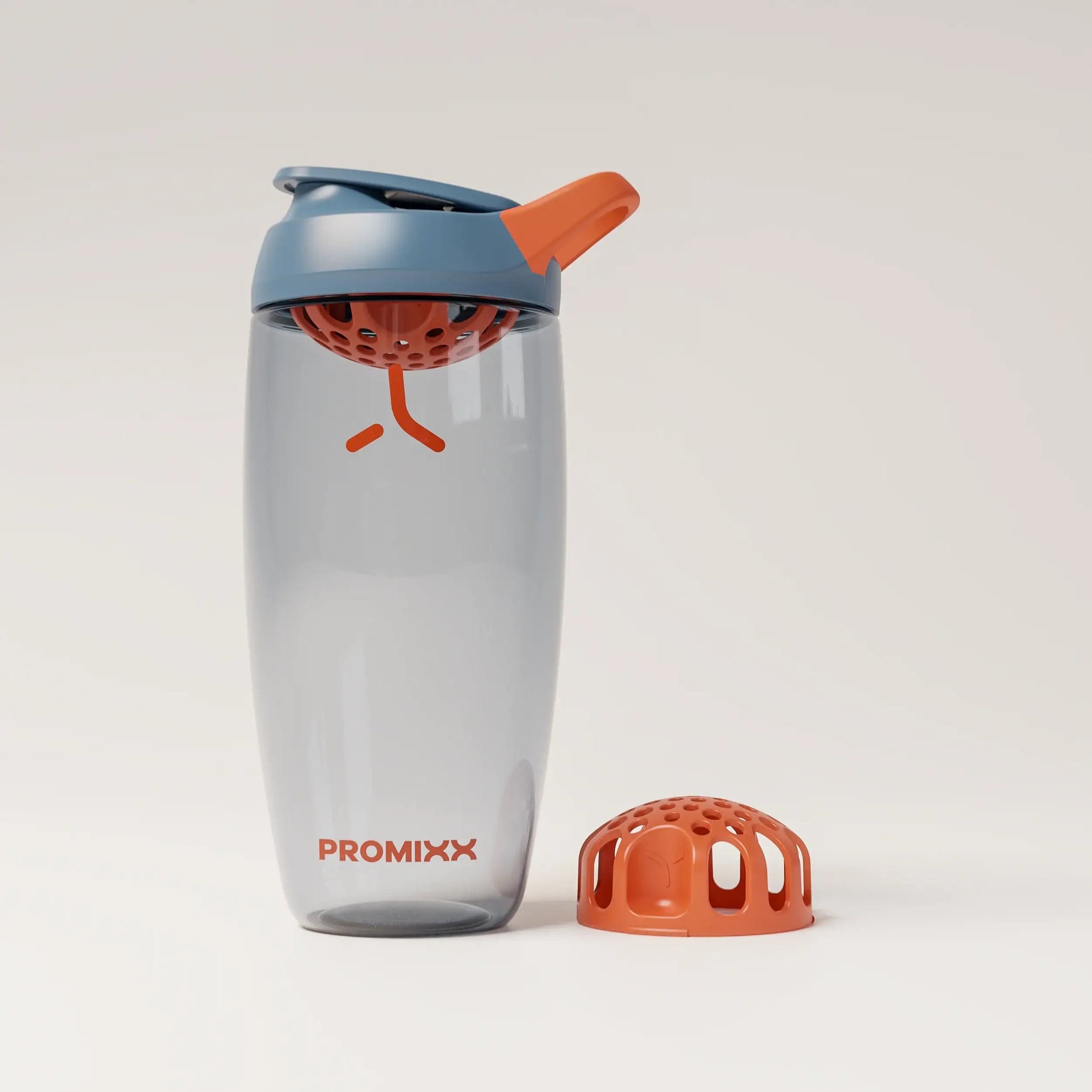 ecozen-performance-shaker-bottle-z8 SHKR_24700_P-S1_heroAgitatorFloor_midnightBlue_burntOrange_1_1_hero_edit_f37f5a2f-8cd4-4264-9ff5-4468aea63a90.png